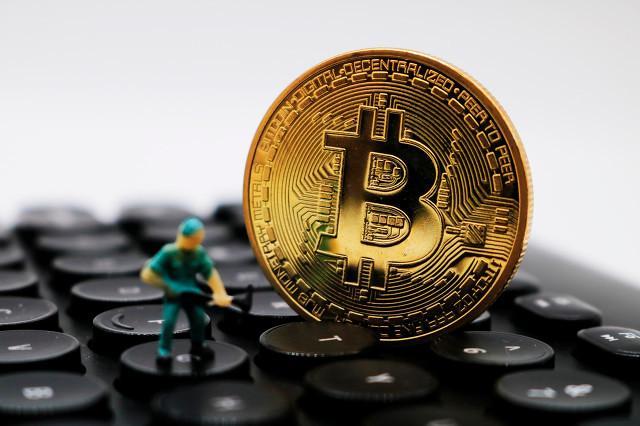 挖比特币技术(挖比特币是在算什么)